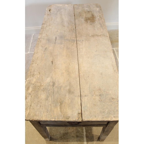 660 - A 19th century rustic pine slab top farmhouse kitchen table, the rectangular top above a single frie... 