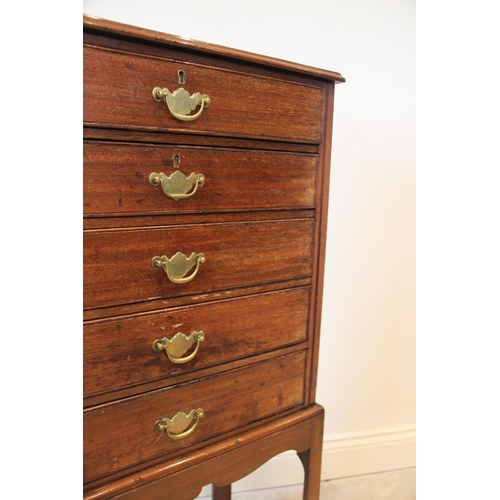 661 - A late 19th /early 20th century mahogany specimen chest on stand, the rectangular moulded top over f... 