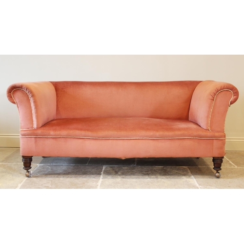 671 - A late Victorian Chesterfield type drop end settee, upholstered in pink velour with applied piping, ... 