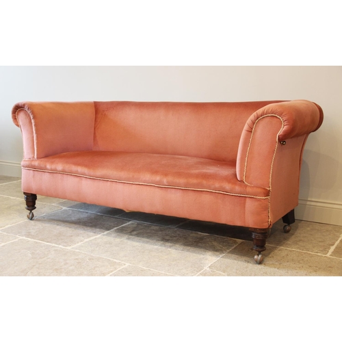 671 - A late Victorian Chesterfield type drop end settee, upholstered in pink velour with applied piping, ... 