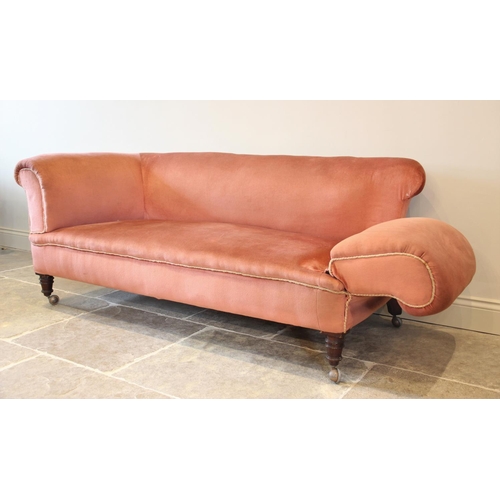 672 - A late Victorian Chesterfield type drop end settee, upholstered in pink velour with applied piping, ... 