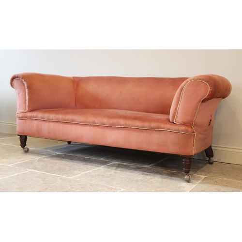 672 - A late Victorian Chesterfield type drop end settee, upholstered in pink velour with applied piping, ... 