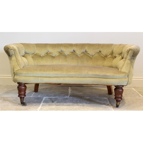 680 - A Victorian kidney shaped Chesterfield type settee of cottage proportions, in green velour fabric, t... 