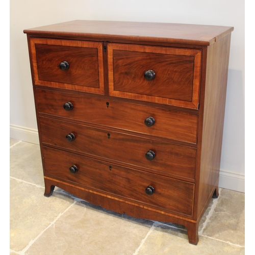 693 - An early 19th century mahogany and satinwood cross banded secretaire chest of drawers, the fall fron... 