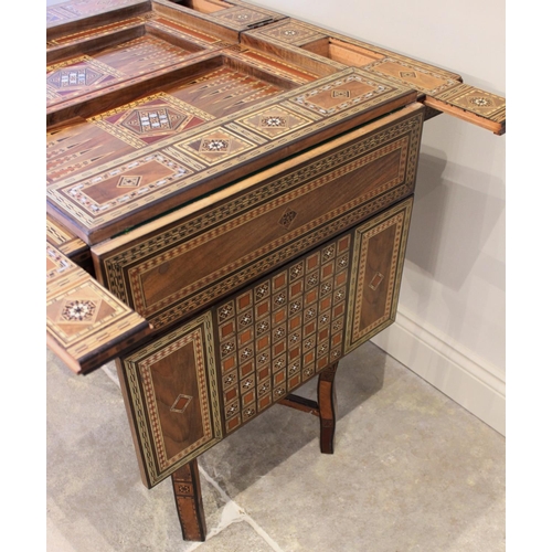 699 - A late 19th century Syrian Damascus mother or pearl and bone parquetry hardwood games table, applied... 