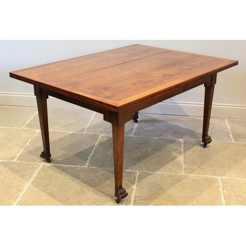 700 - A 19th century French cherry wood draw leaf dining table, the rectangular table top above an angular... 