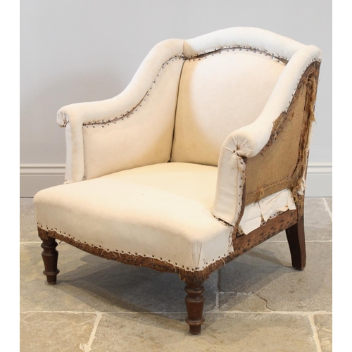 702 - A 19th century ladies low seat armchair, the arched back extending to out swept arms over a serpenti... 