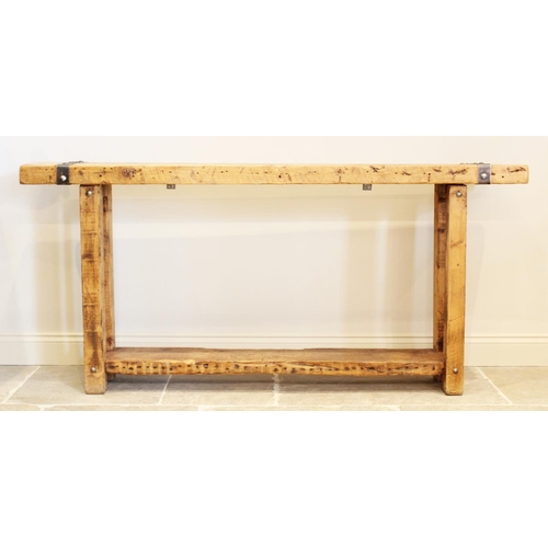 706 - A rustic hardwood and iron bound console table, the slab top applied with rivet detail iron work, up... 