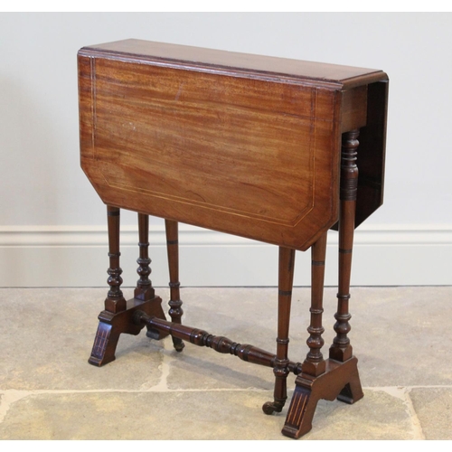 708 - An Edwardian mahogany Sutherland table, the rectangular drop leaf top with inlaid stringing and cant... 