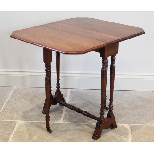 708 - An Edwardian mahogany Sutherland table, the rectangular drop leaf top with inlaid stringing and cant... 