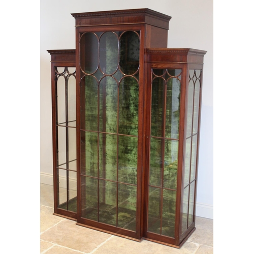 710 - A full height breakfront display cabinet, in the Edwardian style, with three astragal glazed doors a... 