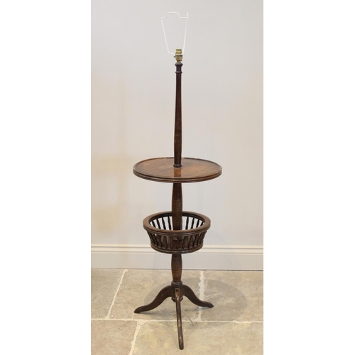 714 - An early 20th century stained beech wood standard lamp and dumb waiter combined, the top circular mo... 