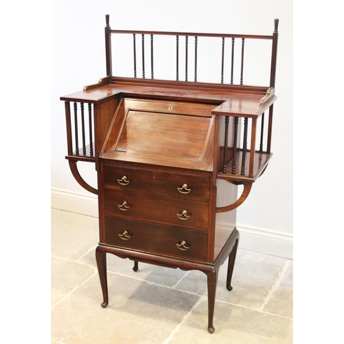 721 - An early 20th century Arts and Crafts mahogany bureau, by Maple & Co, the angular 'U' shaped top wit... 