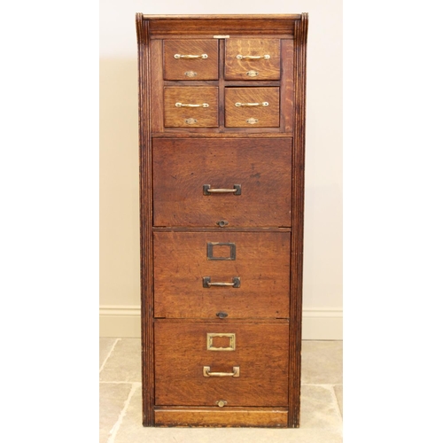 723 - An early 20th century 'Shannon' oak filing cabinet, circa 1930, applied with the makers name above f... 