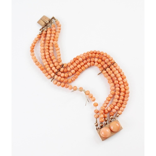 95 - A Victorian three row coral beaded choker necklace, comprising three rows of graduated polished cora... 