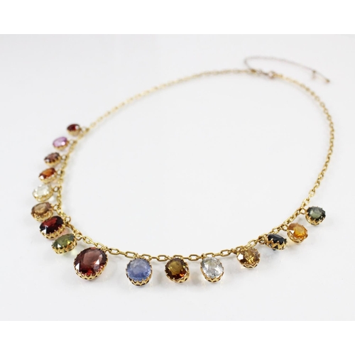 96 - A 19th century and later multi gem set fringe necklace, comprising sixteen graduated oval gemstones,... 