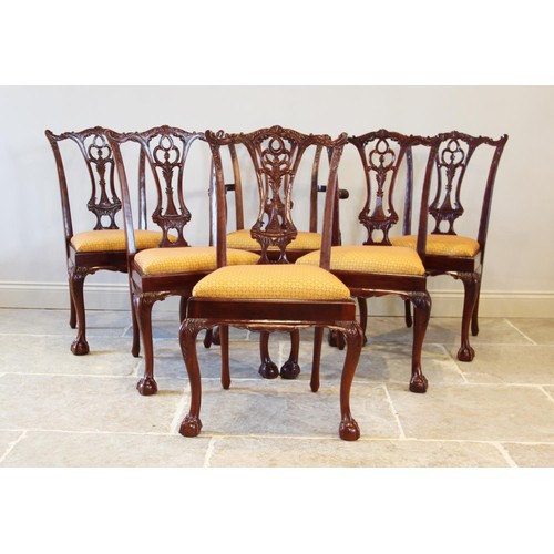 704 - A set of ten Chippendale style mahogany dining chairs, late 20th century, each with an interlaced sp... 