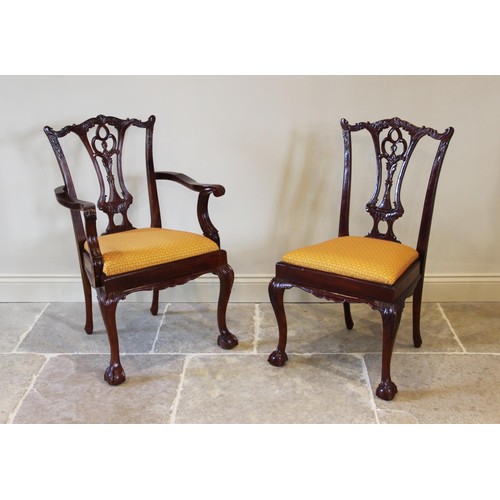 704 - A set of ten Chippendale style mahogany dining chairs, late 20th century, each with an interlaced sp... 