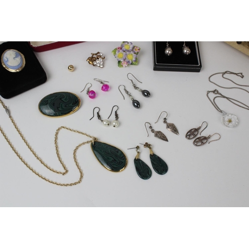 169 - An assortment of costume jewellery, to include a selection of silver and white metal Celtic style ea... 