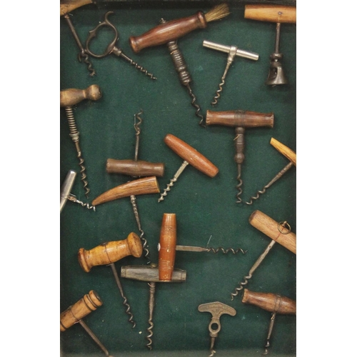 176 - A collection of nineteen corkscrews, early 19th century and later, to include wooden, horn, metal an... 