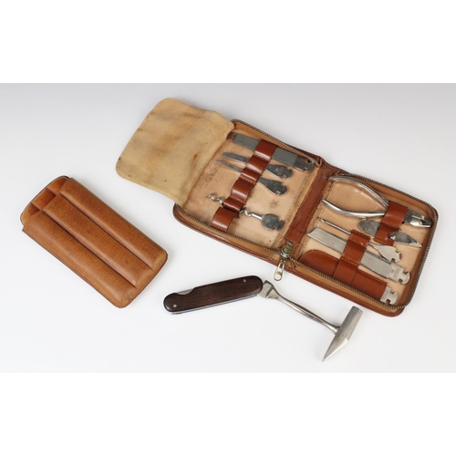 185 - A cased travelling tool kit by Dreizack Solingen of Germany, 20th century, comprising screwdrivers, ... 