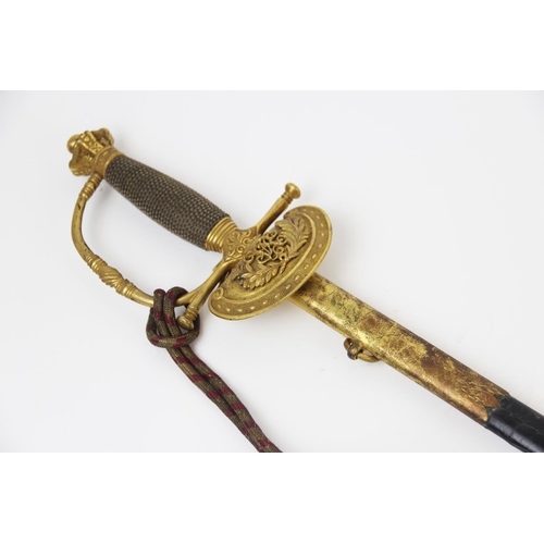 205 - A Victorian military court sword, 19th century, the 78.5cm double edged unfullered florally etched b... 