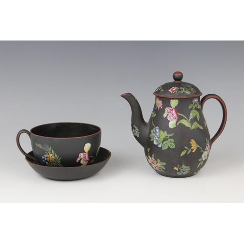 240 - A selection of Wedgwood black basalt tea wares decorated in the 'Chinese Flowers' pattern, 19th cent... 