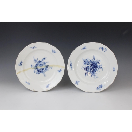 244 - Four Meissen blue and white plates, 19th century, each decorated with central floral spray, with flo... 