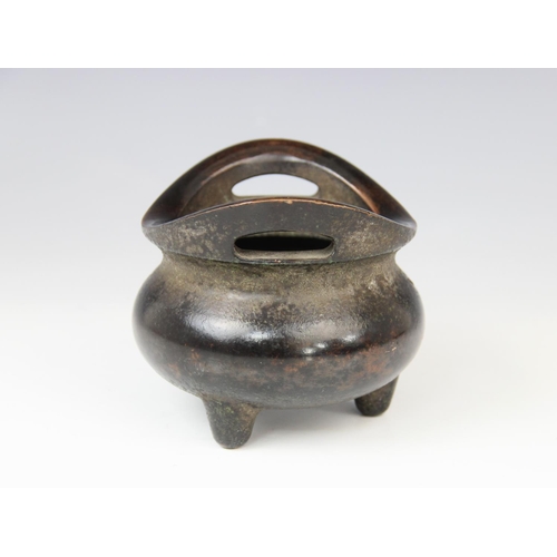 284 - A Chinese bronze censer, with archaic four character mark, 12cm wide