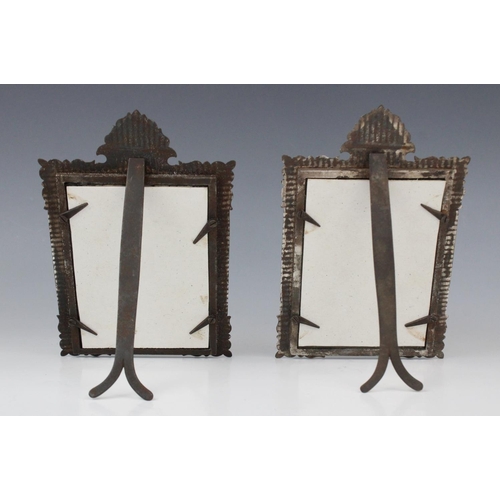 290 - A pair of Islamic style niello gilt and white metal inlaid crested frames, extensively decorated wit... 