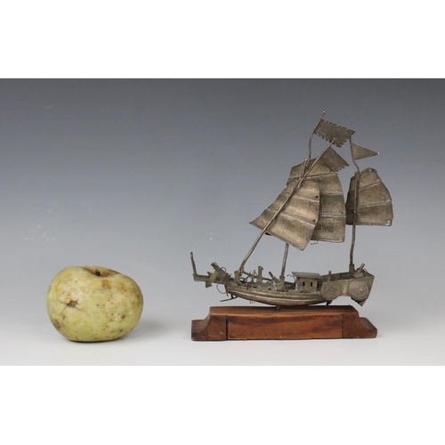 293 - A selection of Chinese objects of virtue to include a white metal model of a junk, on hardwood stand... 