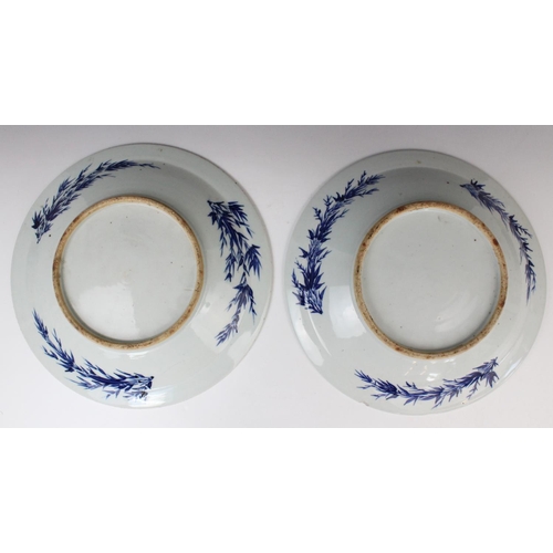 295 - A pair of Chinese porcelain blue and white chargers, late 19th century, each of circular form and wi... 