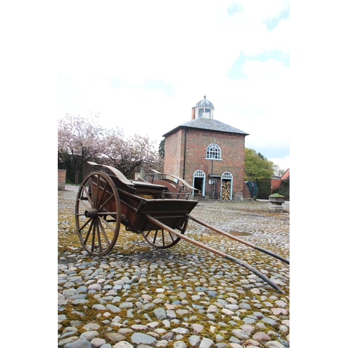 313 - An early 20th century single pony trap by J.B. Huxley & Co, Whitchurch, the 4ft wide frame with orig... 