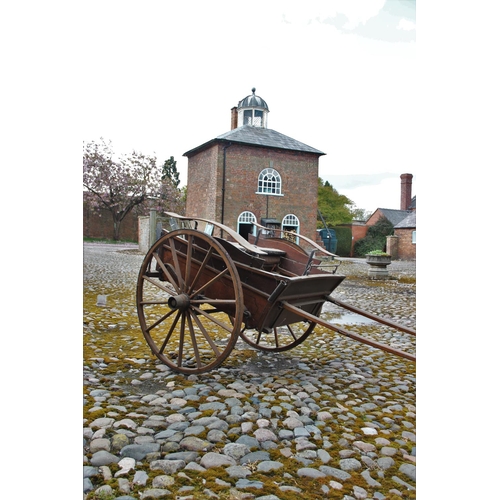 313 - An early 20th century single pony trap by J.B. Huxley & Co, Whitchurch, the 4ft wide frame with orig... 