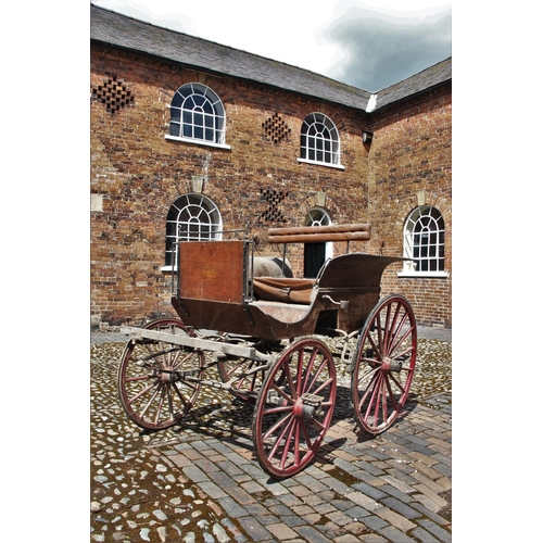 314 - A 19th/20th century horse drawn carriage/trap, the 7ft long cart supporting four iron wheels, the re... 