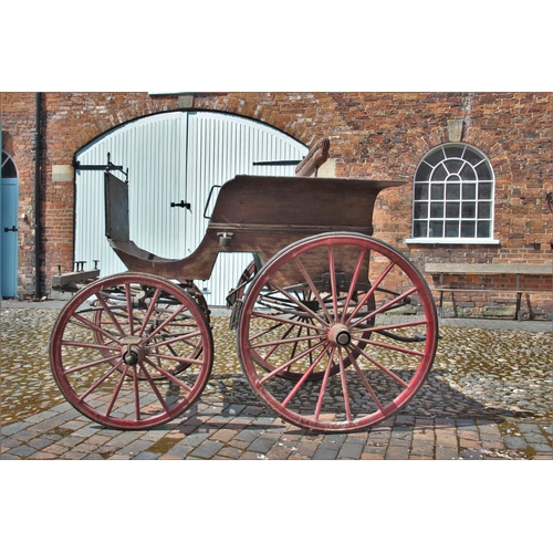 314 - A 19th/20th century horse drawn carriage/trap, the 7ft long cart supporting four iron wheels, the re... 