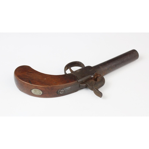 320 - A percussion cap pocket or muff pistol, probably early 19th century, of typical form with 3/8