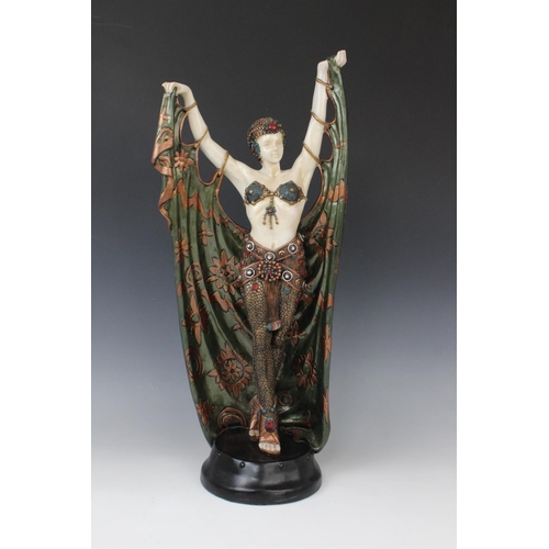 345 - A pair of composite Art Deco style faux chryselephantine figures, late 20th century, modelled in the... 