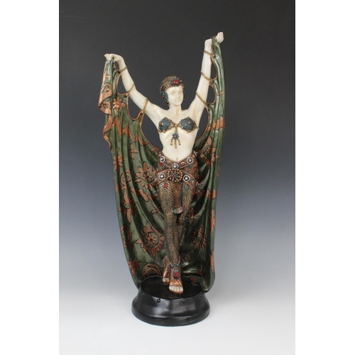 345 - A pair of composite Art Deco style faux chryselephantine figures, late 20th century, modelled in the... 