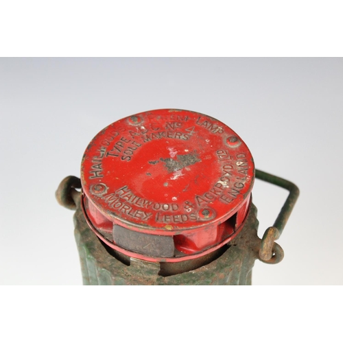 360 - A vintage Hailwood's Patent miner's lamp 'Type ADC No 4', 20th century, red and green painted with r... 