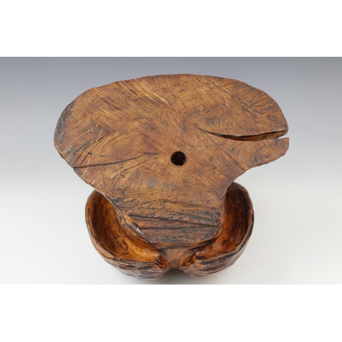 362 - A chip carved wooden model of an owl, 20th century, modelled with beak open and wings slightly sprea... 