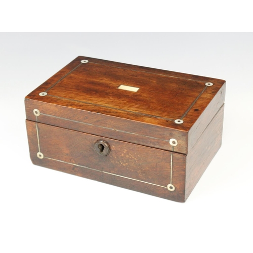 369 - A 19th century rosewood stationery box, the cover centred with an inlaid mother of pearl star rounde... 