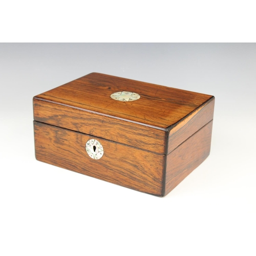 369 - A 19th century rosewood stationery box, the cover centred with an inlaid mother of pearl star rounde... 