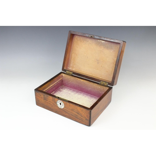 369 - A 19th century rosewood stationery box, the cover centred with an inlaid mother of pearl star rounde... 