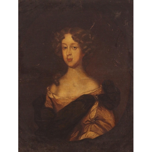 562 - Follower of Sir Godfrey Kneller (1646-1723), 
Portrait of a young lady in a painted, 
Oval oil on ca... 