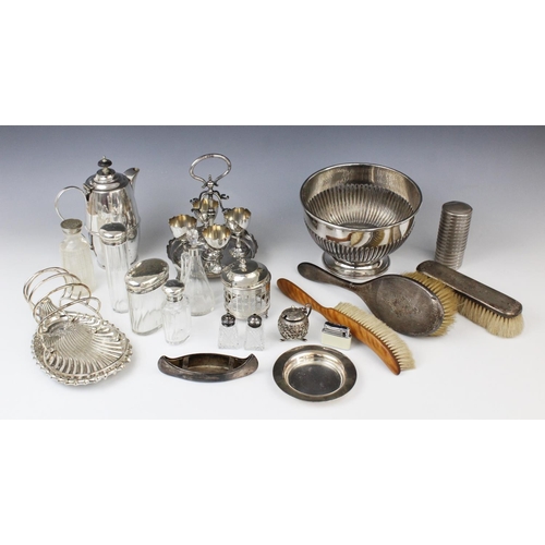 70 - A selection of silver, silver plated and EPNS wares, to include; a George V silver Punch rattle, Bir... 