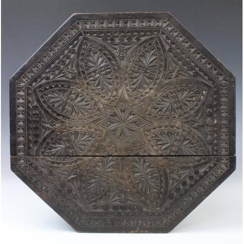 703 - An Anglo-Indian carved hardwood occasional table, early 20th century, the octagonal table top with c... 