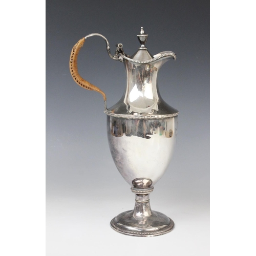 73 - An Adam style Old Sheffield Plate water ewer, 19th century, of classical form engraved with a coat o... 