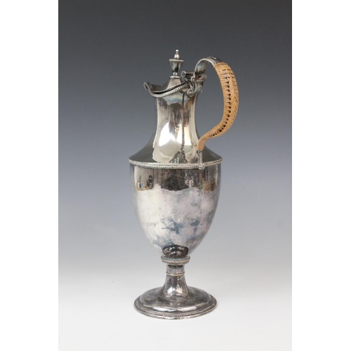 73 - An Adam style Old Sheffield Plate water ewer, 19th century, of classical form engraved with a coat o... 