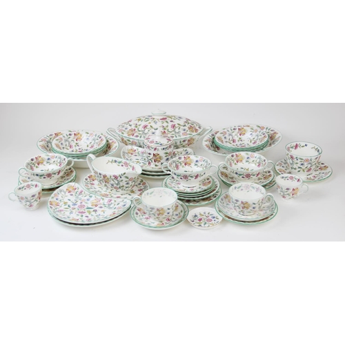 210 - A Minton 'Haddon Hall' pattern part dinner service, comprising: an oval serving dish and cover, two ... 